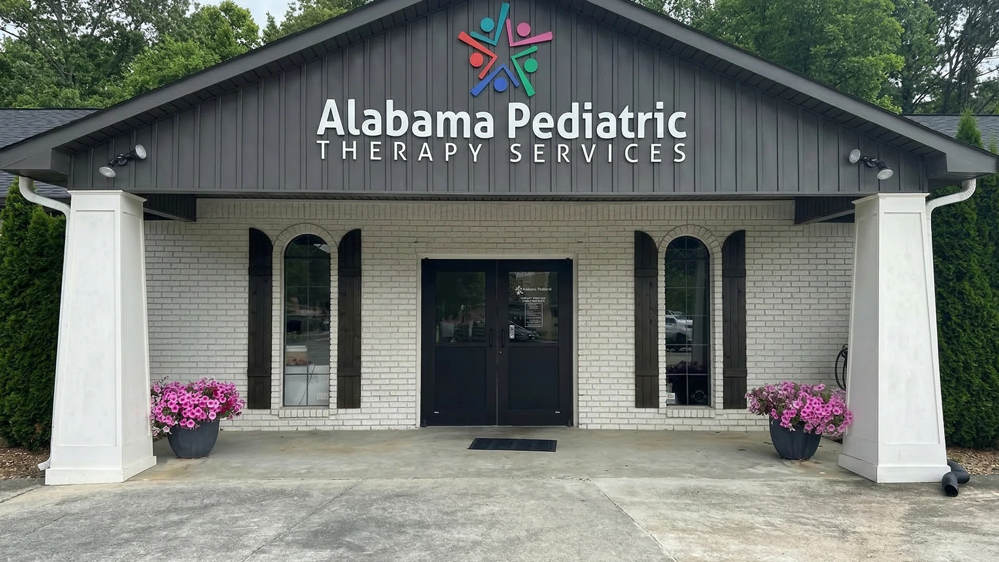 pediatric therapy team collaborating at Alabama Pediatric Therapy Services clinic
